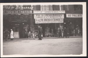 France Postcard - Street of Shops - Where Please - Showing J.M.Soubirous V1621