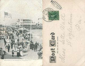 WILDWOOD N.J. STROLLING ON THE BOARDWALK UNDIVIDED ANTIQUE POSTCARD CORK STAMP