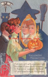 344429-Halloween, Nash No 2S-2a, Precautions, Woman Holds Lighted JOL