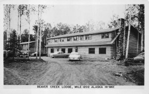 RPPC BEAVER CREEK LODGE MILE 1202 ALASKA HI-WAY REAL PHOTO POSTCARD (c. 1940s)