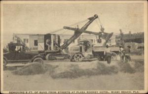 Miami Beach FL Trucks & Shovel Remove Sand From Street at Plaza Rooney Hotel 