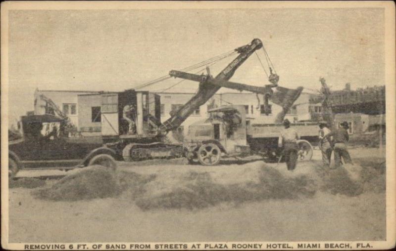 Miami Beach FL Trucks & Shovel Remove Sand From Street at Plaza Rooney Hotel 