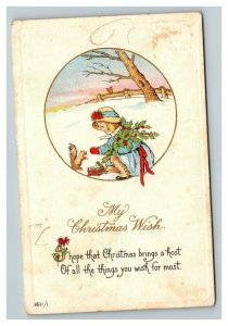 Vintage 1910's Christmas Postcard Cute Girl Playing with Squirrel Mistletoe