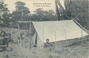 Oceania Papua New Guinea a tent camp in the bush native ethnic life postcard