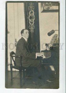 3105533 PIANIST near Grand PIANO Vintage Real Photo PC