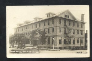 RPPC SAC CITY IOWA ROARK HOTEL OLD CARS VINTAGE REAL PHOTO POSTCARD