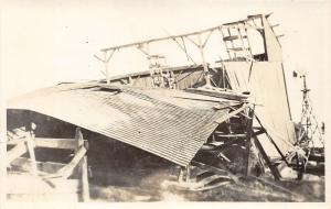 Nebraska?~Barn Demolished by Tornado~Windmill in Background~c1920 Real Photo PC