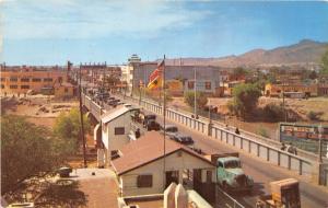 JUAREZ MEXICO~INTERNATIONAL BRIDGE~BIRDSEYE VIEW~OLD VEHICLES POSTCARD 1953 PSMK