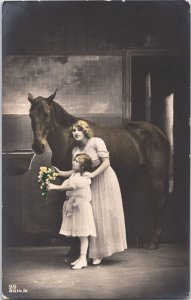 Victorian Mother Daughter With A Black Horse Vintage RPPC 09.45