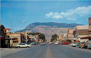 1960s Postcard; Cody WY Sheridan Street Scene Business Signs Cool Cars Unposted