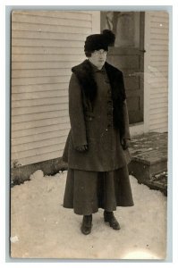 Vintage 1918 RPPC Postcard Woman Dressed for the Snow Suburban Home