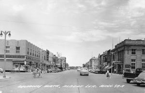 Albert Lea MN~Broadway Street North~Woolworth~Cafe~Dairy~Shoe Store~1950 RPPC 