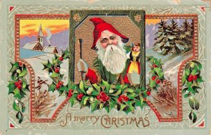 Green Suit Old World Santa Claus-Cane-Red Hat-Holding Doll~1914 Gilt POSTCARD
