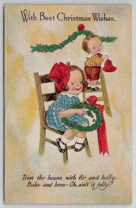 Christmas Greetings Children Decorating Wreath Bell Postcard U26