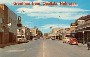 Ogallala Nebraska Greetings From businesses 1st Nat'l Bank vintage pc ZD549856