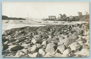 Boothbay Harbor Maine~View Across Rocks to Fishing Shacks~Boats~c1918 RPPC 