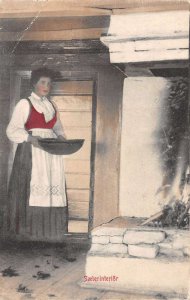 Norway Saeter Interior Woman with Bowl by Fireplace Vintage Postcard AA53984