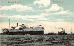 Curacao D.W.I. view of ships taking fuel oil antique pc ZE686076