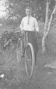 PROUD YOUNG BOY IN SHIRT & TIE WITH BICYCLE~1910s REAL PHOTO POSTCARD