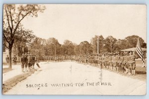 St. Louis MO Postcard RPPC Photo Soldiers Waiting For Their Mail Military Camp