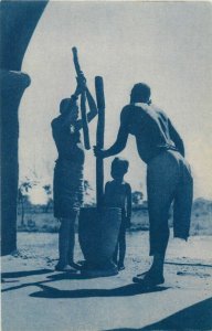 Cultures & Ethnicities Africa ethnic life pounding millet in Upper Volta 