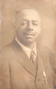 RPPC WELL DRESSED MAN JEWELRY BLACK AMERICANA STUDIO REAL PHOTO POSTCARD (1910)