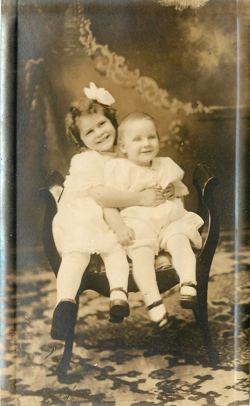 1910s Studio RPPC Postcard Happy Smiling Children Infants Hugging each Other