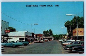 c1950 Greetings From Luck Classic Cars Parking Wisconsin Correspondence Postcard