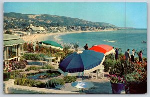 Laguna Beach California~Victor Hugo Inn~Patio Umbrellas~Boat~Vintage Postcard