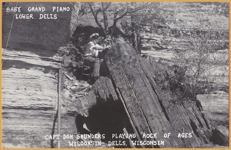 RPPC-Baby Grand Piano, Lower Wisconsin Dells-Capt. Don Saunders Playing Rock of 