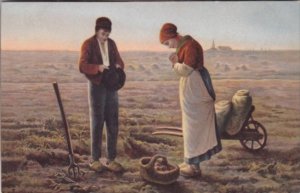 Couple Farmers Praying Over Crop