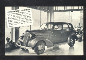 1937 CHEVROLET SEDAN MENARD TEXAS CAR DEALER ADVERTISING VINTAGE POSTCARD