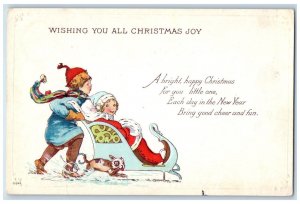 c1910's Christmas Boy Sled Santa Girl Dog Winter Snow Embossed Antique Postcard