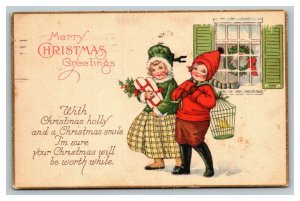 Vintage 1924 Christmas Postcard Cute Children with Presents Mistletoe Berries