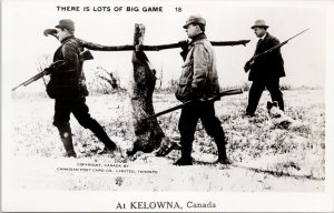 Kelowna BC Hunters with Huge Rabbit Exaggeration Hare Hunting RPPC Postcard G35