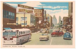 WINDSOR CANADA OULLETTE STREET in 1940'S STORES & TRAFFIC TINTED POSTCARD