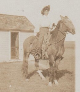 SD rppc c1910 COWGIRL Prairie CLAIM SHACK Ranch READY FOR ROUNDUP Leeland