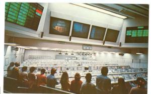 Visitors observing recreation of Apollo XI Launch Postcard