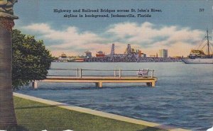 Highway And Railroad Bridges Across Saint Johns River Skyline In Background J...