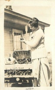 C-1910 Farm Agriculture Woman Baby chicks RPPC Photo Postcard 22-8705