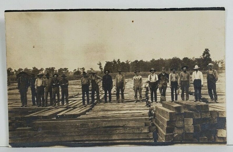 Rppc Occupational America Men Standing on Lumber Pile 100k RR Ties Postcard O18