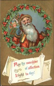 Christmas Santa Claus with Doll and Address Book c1910 Vintage Postcard