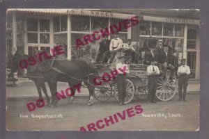 Knoxville IOWA RPPC 1911 FIRE DEPARTMENT Firemen FIRE WAGON Posing MAIN STREET