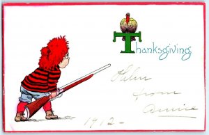 C. 1910 Cute Kid Rifle Gun Turkey Thanksgiving Postcard P191 