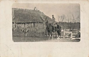 WWI German Soldier on Horseback RPPC 1916 Feldpost Thatch Roof