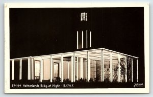 1939 NEW YORK WORLD'S FAIR NETHERLANDS BLDG AT NIGHT RPPC POSTCARD P1775