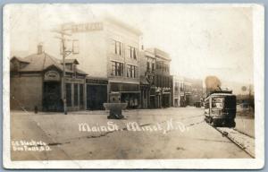 MINOT N. D. MAIN STREET SCENE TRAIN 1912 ANTIQUE PHOTOMONTAGE REAL PHOTO PC RPPC