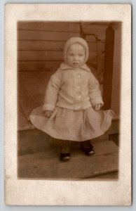 RPPC Cute Little Girl Posing on Porch Bundled Up c1908 Real Photo Postcard J23