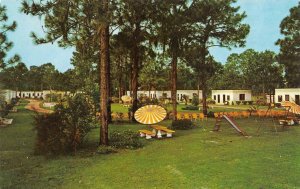 PERRY, FL Florida  PERRY MOTOR COURT MOTEL~OW Jones  ROADSIDE  c1950's Postcard