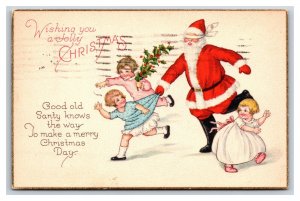 Children Playing With Santa Claus in Blindfold Jolly Christmas DB Postcard R10